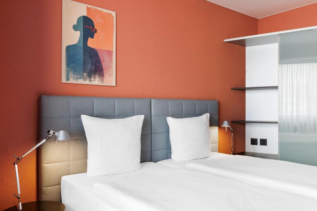 Postel nebo postele na pokoji v ubytování Hotel La Pergola