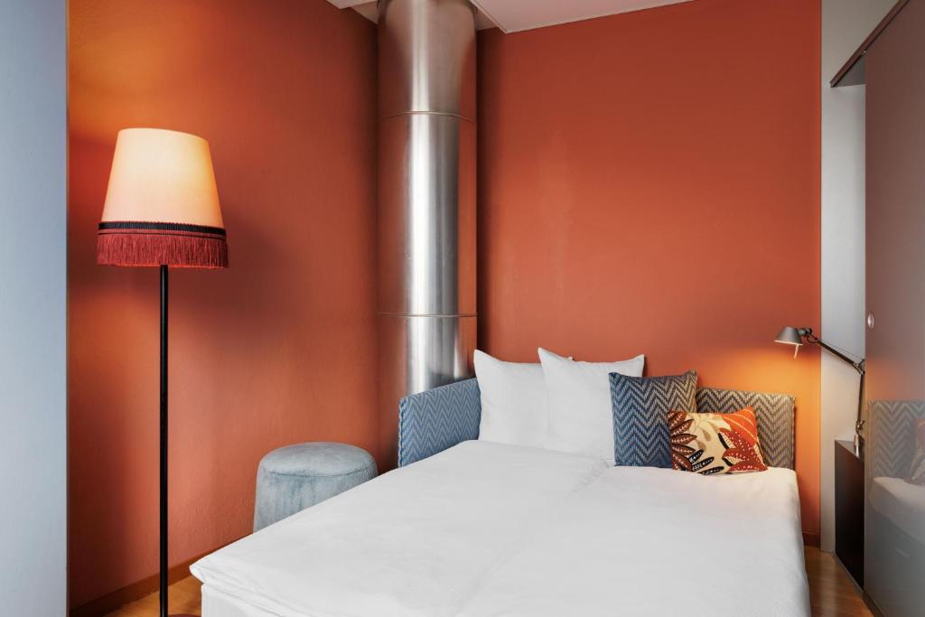 Postel nebo postele na pokoji v ubytování Hotel La Pergola