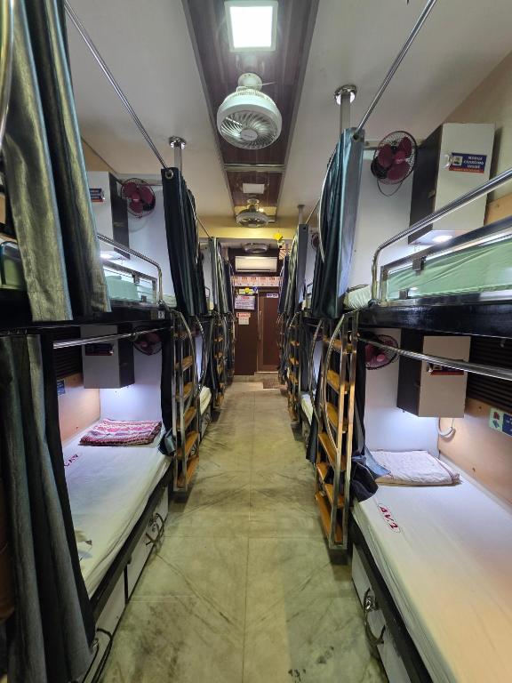 Postel nebo postele na pokoji v ubytování AV Dormitory