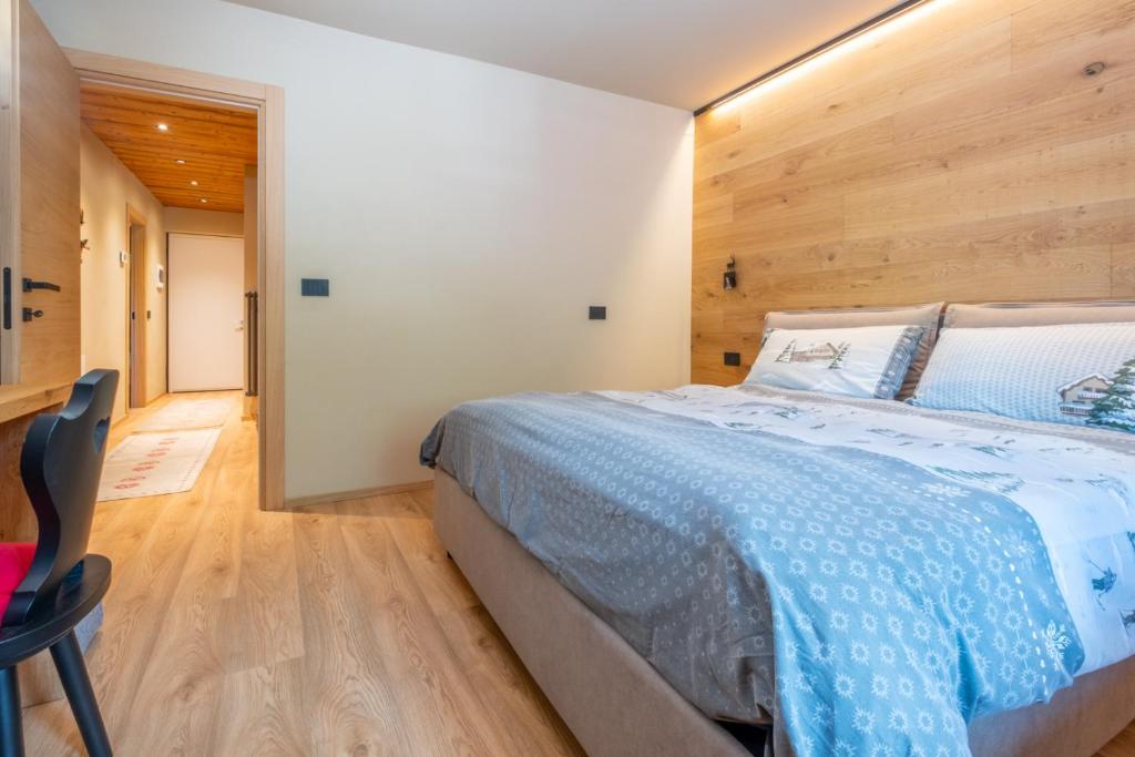 Postel nebo postele na pokoji v ubytování Comfort Apartment Dimaro by Varental