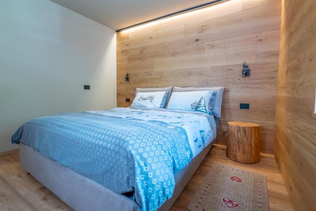 Postel nebo postele na pokoji v ubytování Comfort Apartment Dimaro by Varental