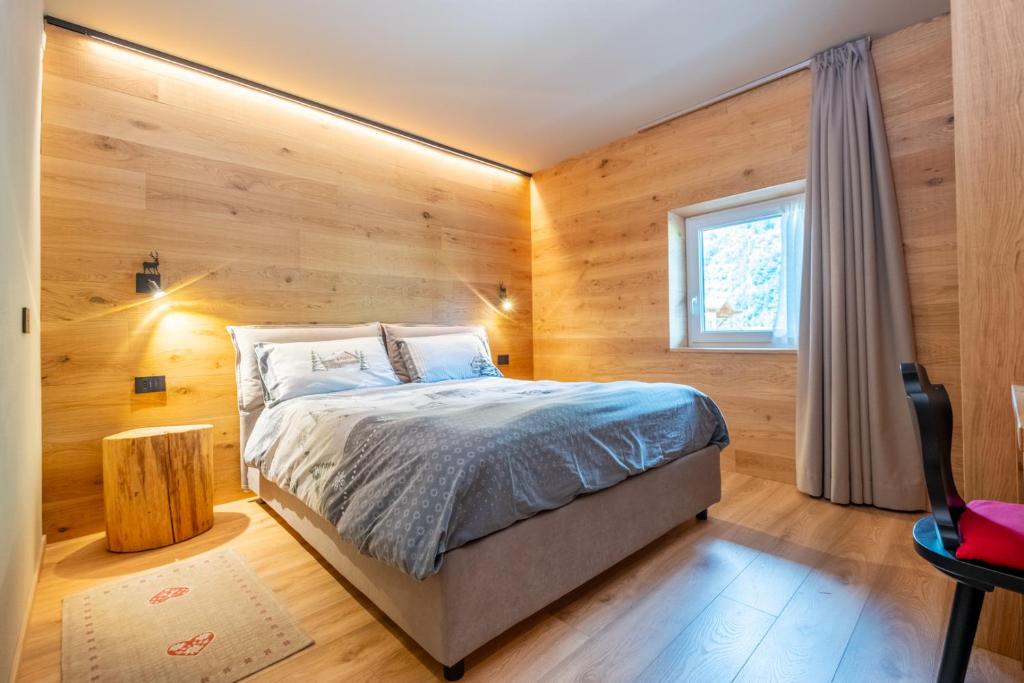 Postel nebo postele na pokoji v ubytování Comfort Apartment Dimaro by Varental
