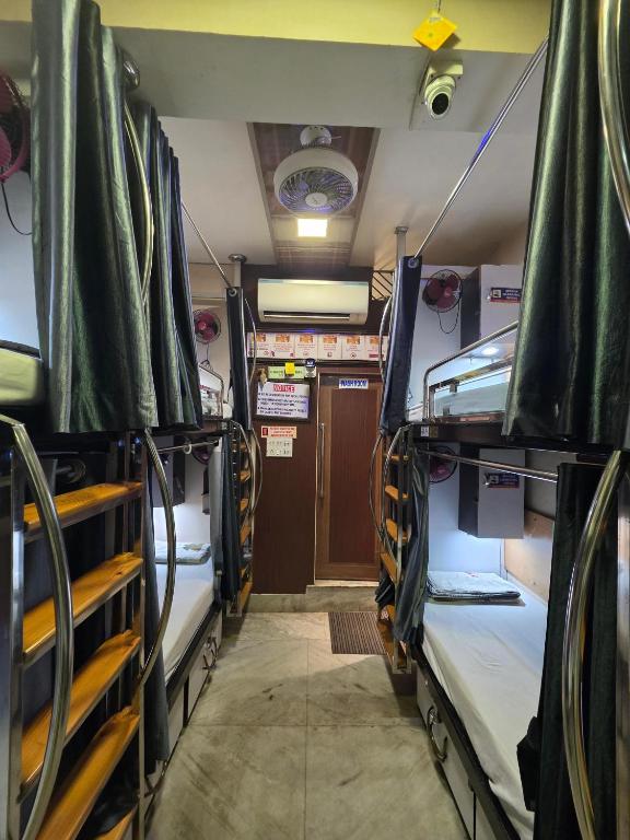 Postel nebo postele na pokoji v ubytování AV Dormitory