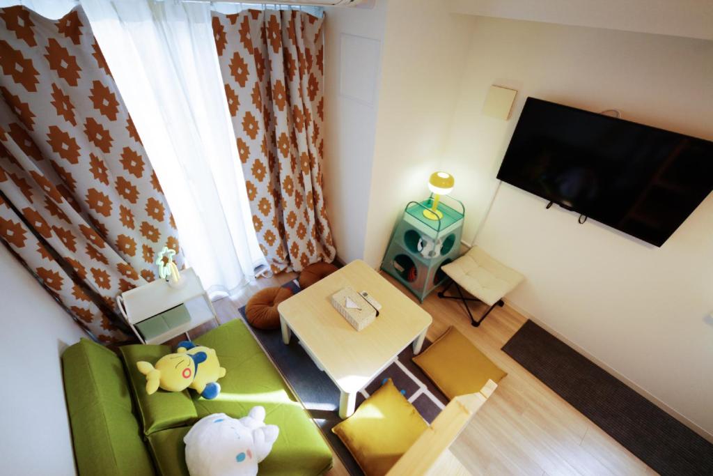 TV a/nebo společenská místnost v ubytování Suke Home Oshiage