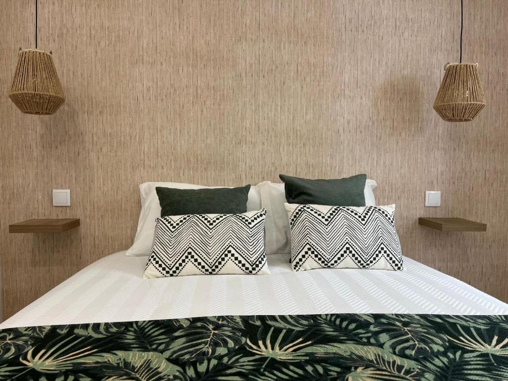 Postel nebo postele na pokoji v ubytování Casa Batel a 100m da praia