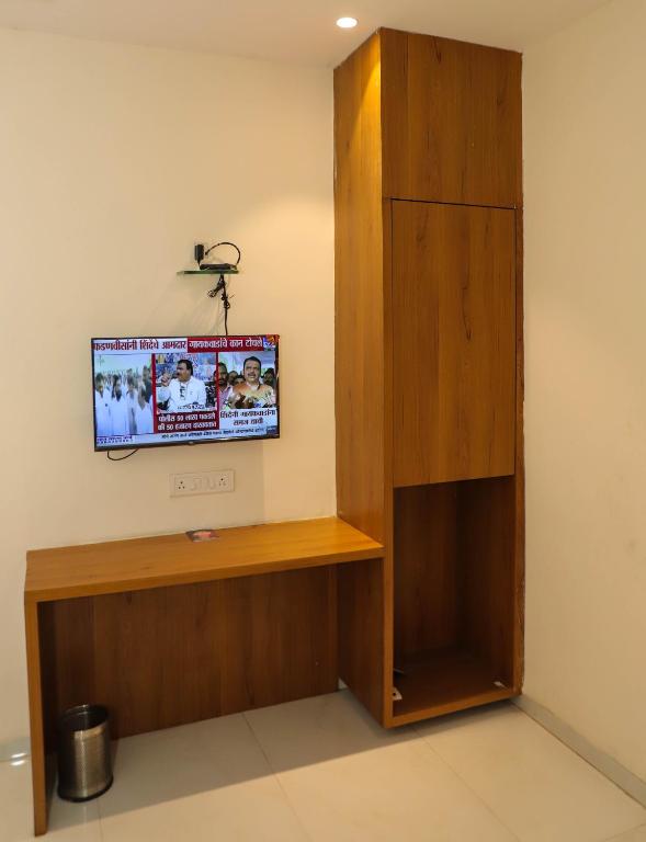 TV a/nebo společenská místnost v ubytování Ruby Loadging & Boarding