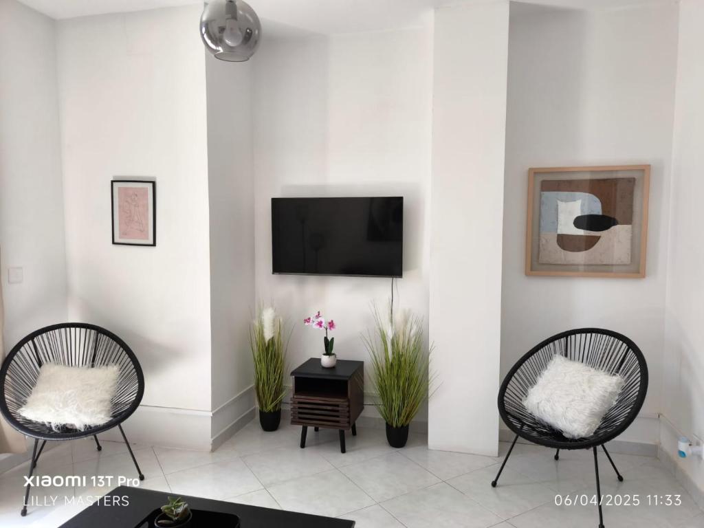 TV a/nebo společenská místnost v ubytování Penthouse Views
