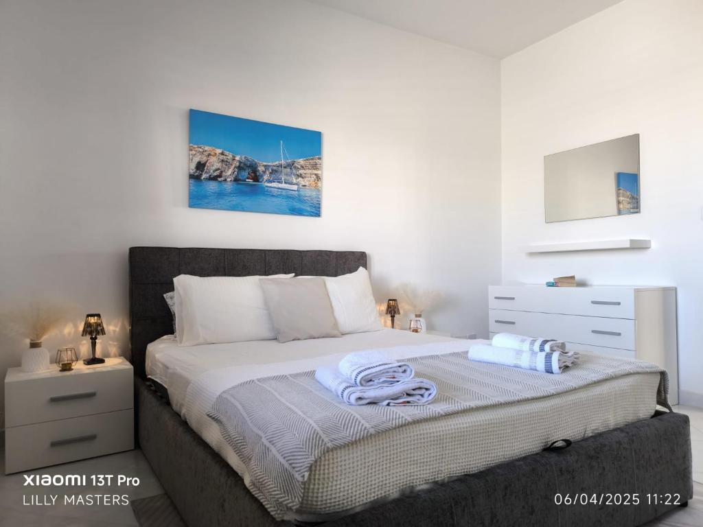 Postel nebo postele na pokoji v ubytování Penthouse Views