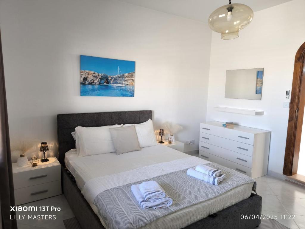 Postel nebo postele na pokoji v ubytování Penthouse Views