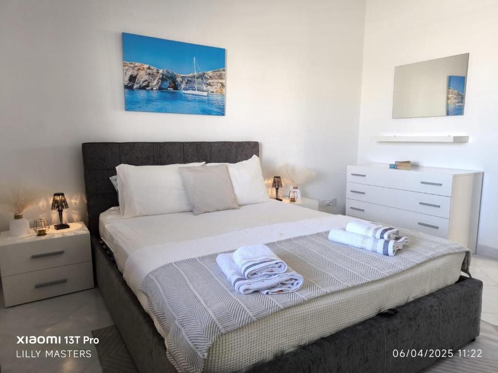Postel nebo postele na pokoji v ubytování Penthouse Views