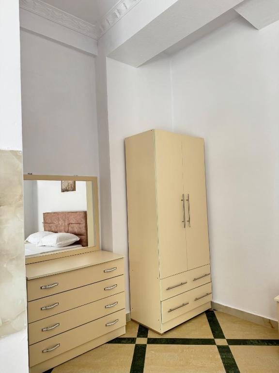Postel nebo postele na pokoji v ubytování LM Murati Hotel