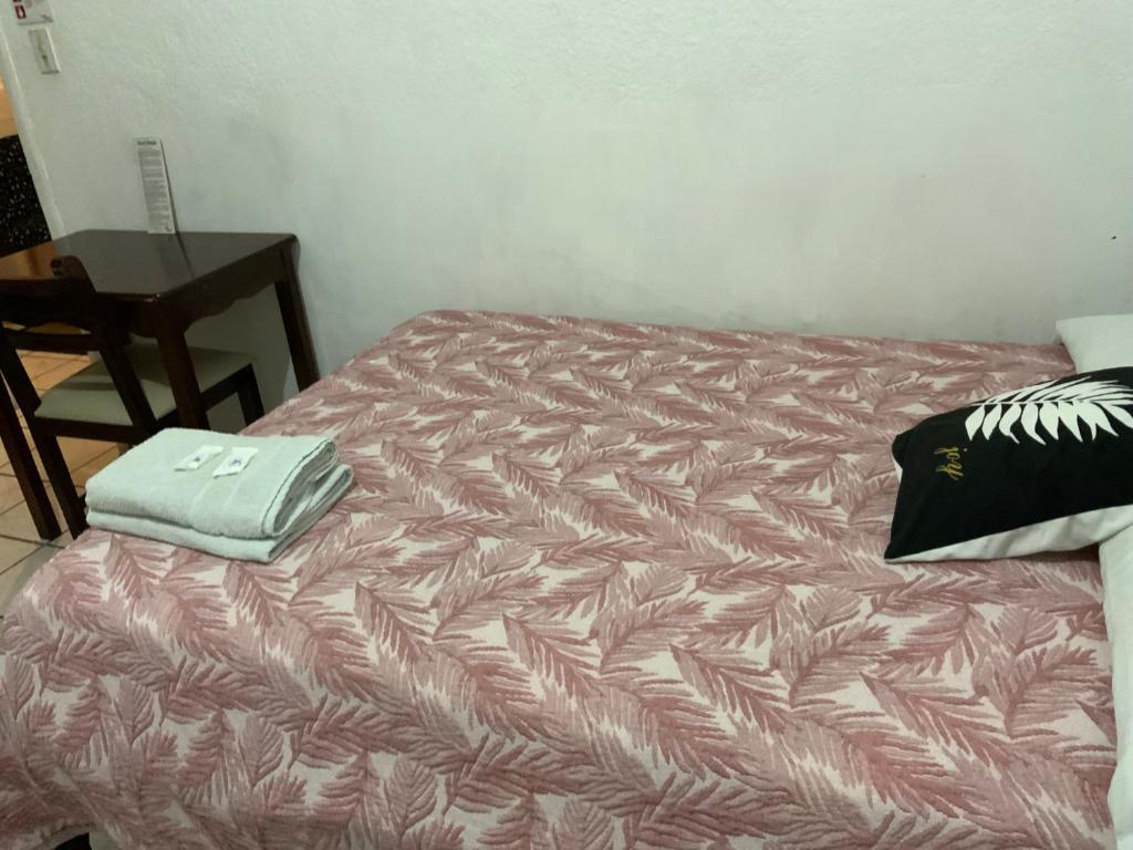 Postel nebo postele na pokoji v ubytování Hostal Almagro