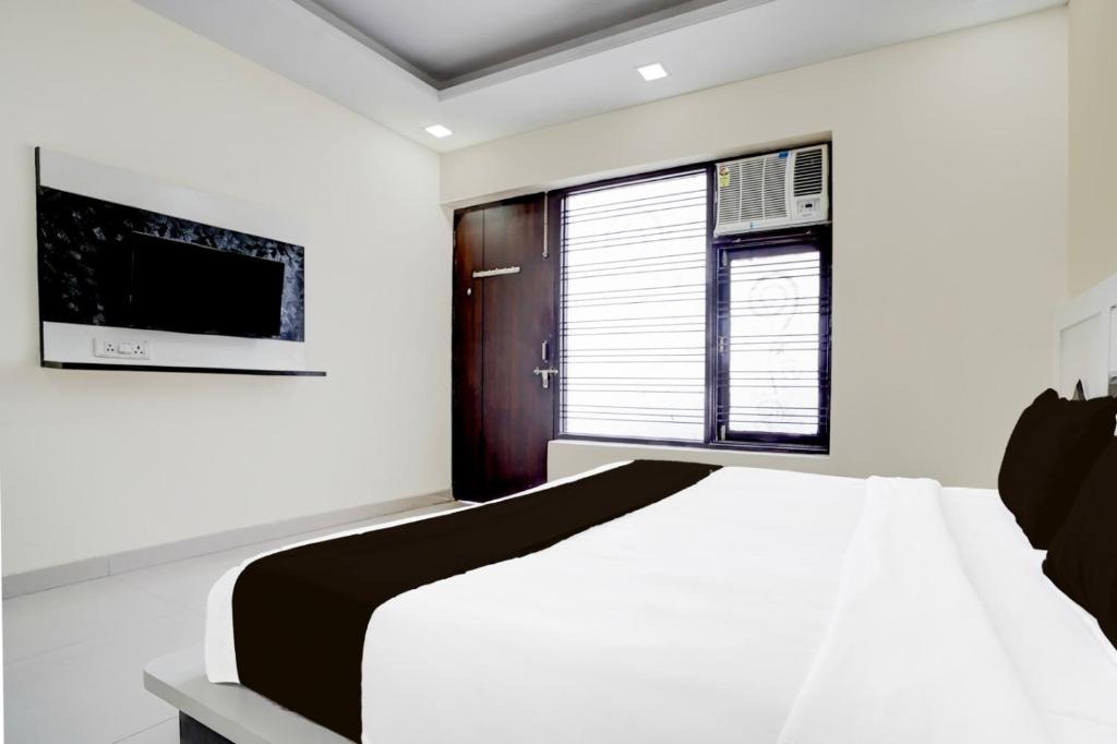 Postel nebo postele na pokoji v ubytování Hotel New City Lite
