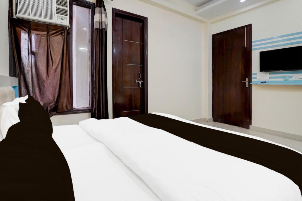 Postel nebo postele na pokoji v ubytování Hotel New City Lite