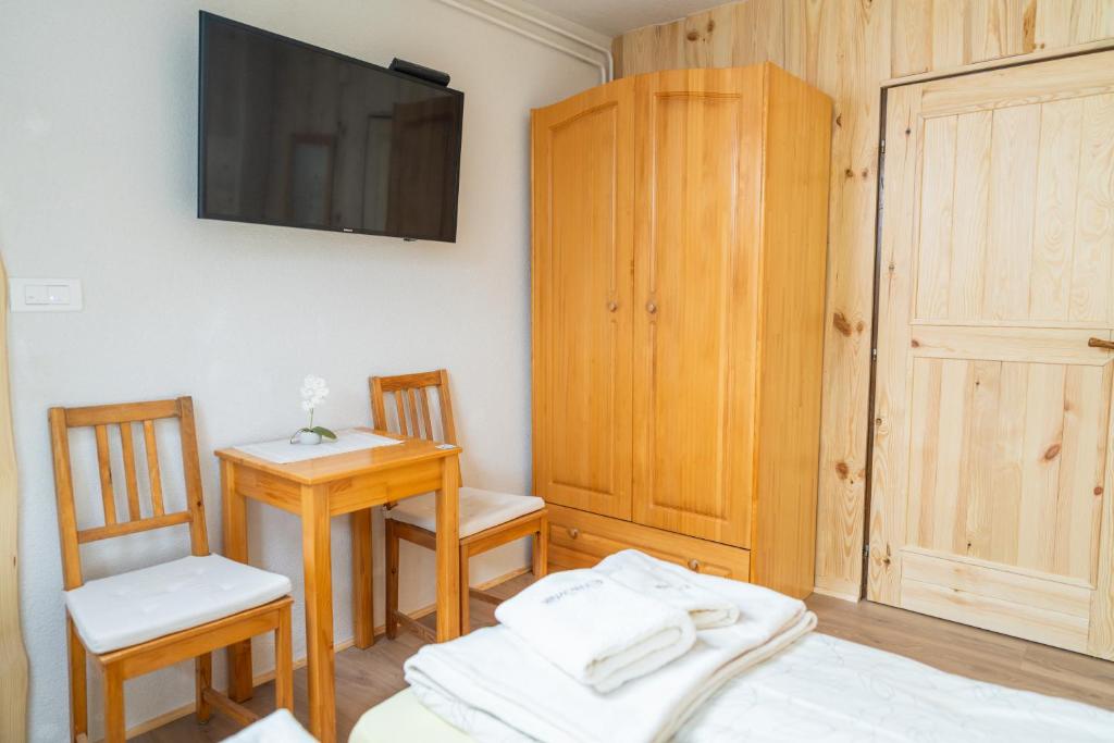 Postel nebo postele na pokoji v ubytování Pension Cerkovnik