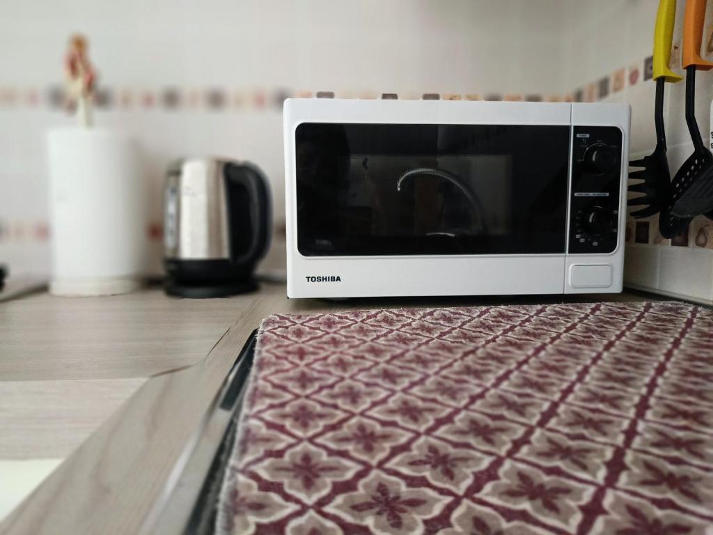 A kitchen or kitchenette at LA CASA DEI NONNI