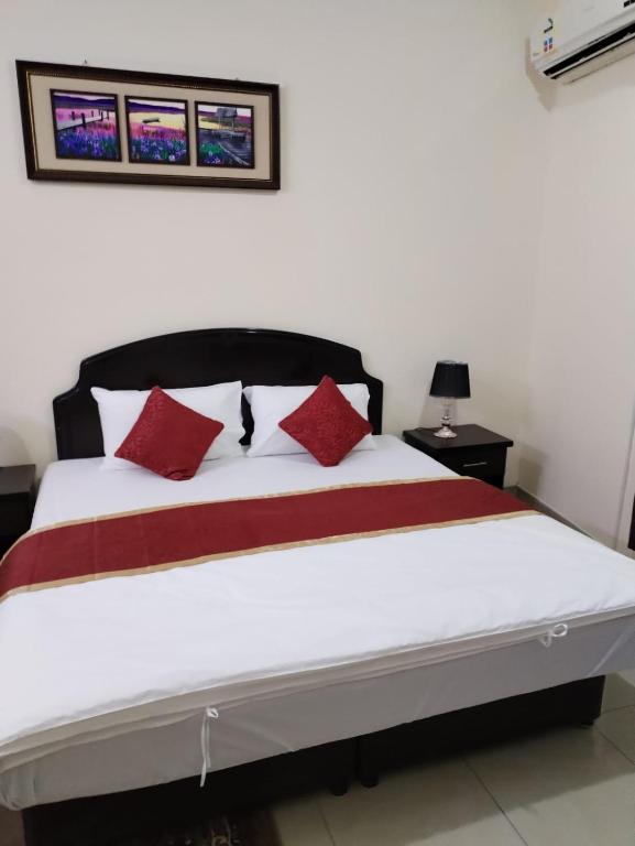 Postel nebo postele na pokoji v ubytování Al Eairy Apartments - Hail 3