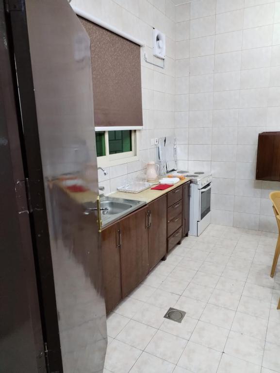 Kuchyň nebo kuchyňský kout v ubytování Al Eairy Apartments - Hail 3