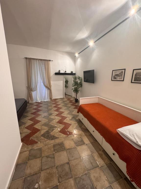 Postel nebo postele na pokoji v ubytování La Casa Nel BORGO