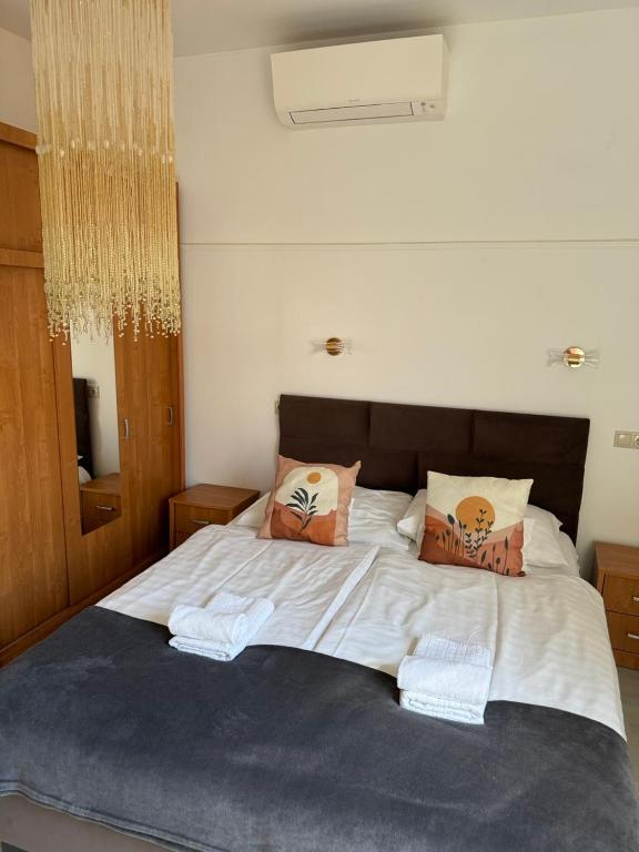 Posteľ alebo postele v izbe v ubytovaní Pension Nest - Family Apartman