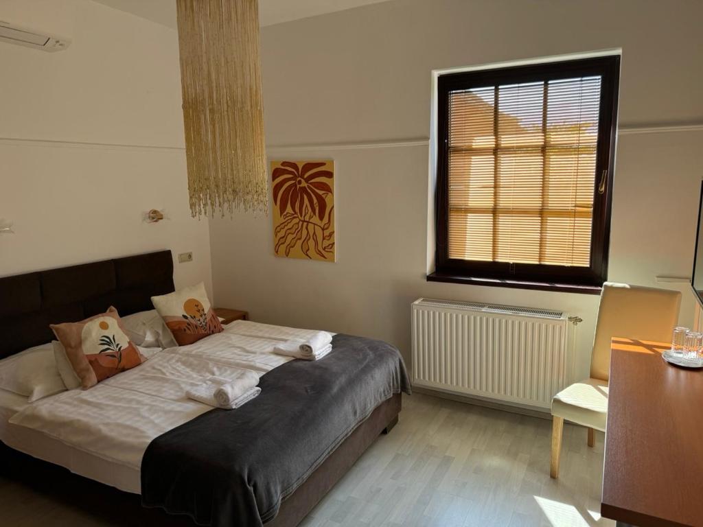 Posteľ alebo postele v izbe v ubytovaní Pension Nest - Family Apartman
