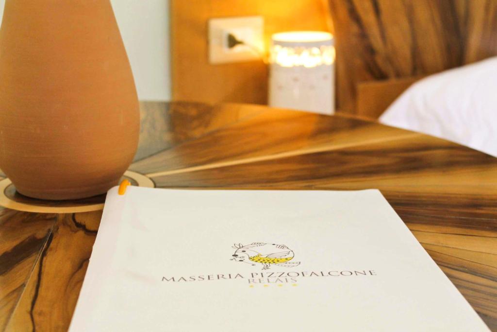 Postel nebo postele na pokoji v ubytování Masseria Pizzofalcone