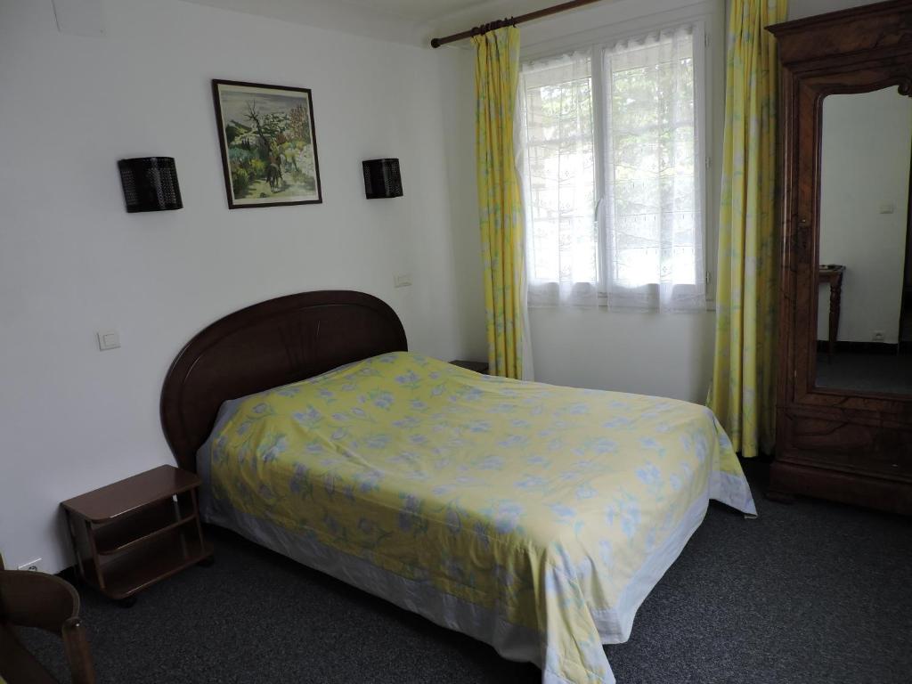 Postel nebo postele na pokoji v ubytování Belvedere Montargis Amilly