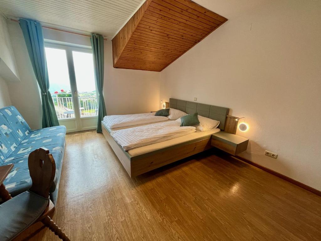 Postel nebo postele na pokoji v ubytování Strengen Guesthouse