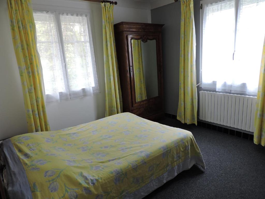 Postel nebo postele na pokoji v ubytování Belvedere Montargis Amilly