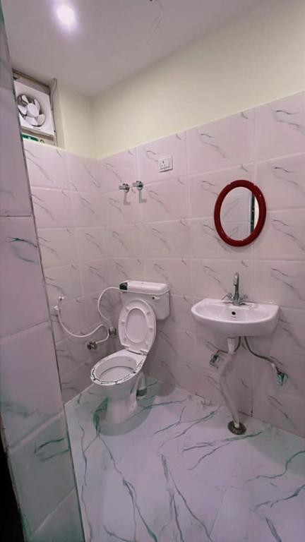 Koupelna v ubytování Tridev Hotel