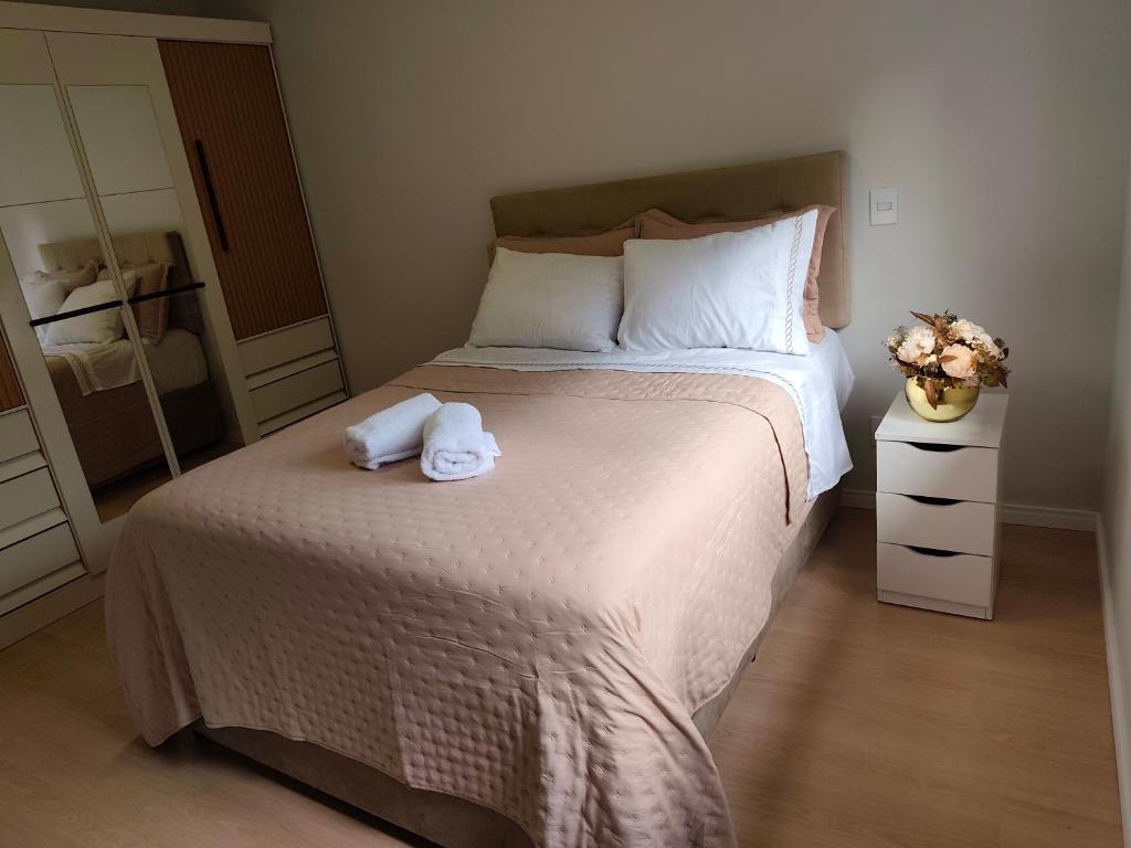 Voodi või voodid majutusasutuse Apartamento de temporada em Gramado com linda vista toas