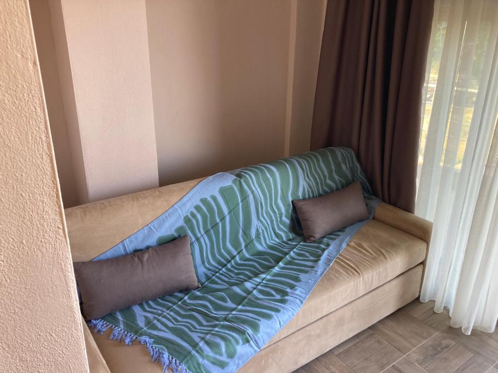 Posezení v ubytování Thealos Rooms