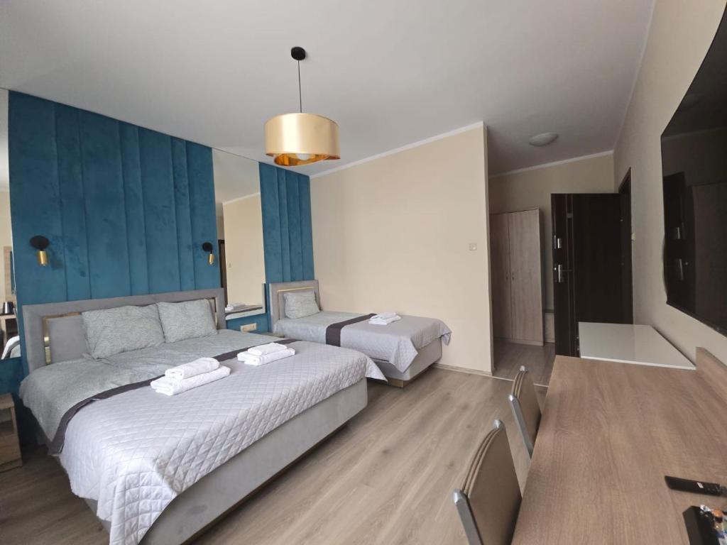 Postel nebo postele na pokoji v ubytování Villa Lima