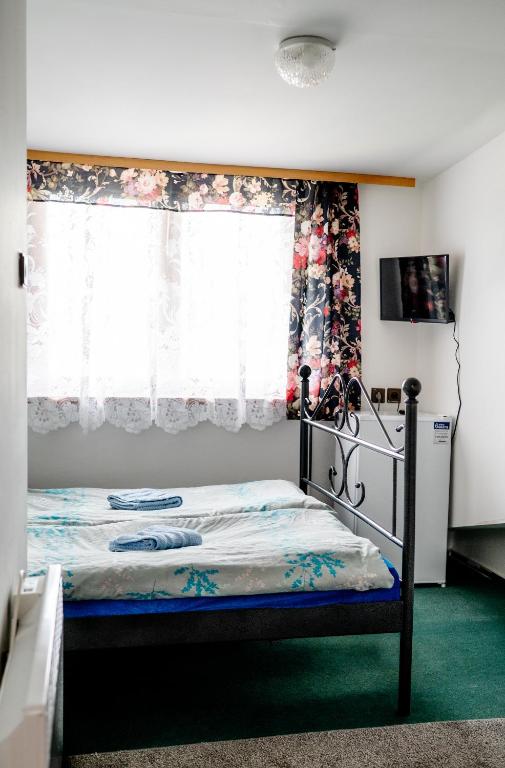 Postel nebo postele na pokoji v ubytování Ubytování Česká Skalice