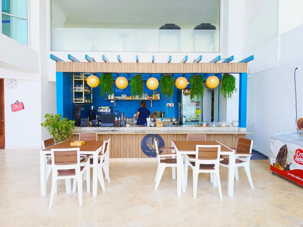 Restaurace v ubytování Apartamentos Palmetto - Frente al Mar