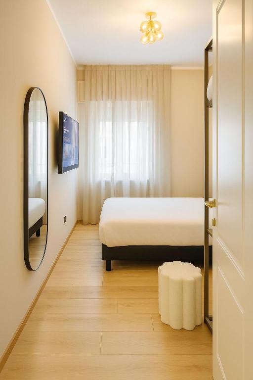 Postel nebo postele na pokoji v ubytování Urban Hotel