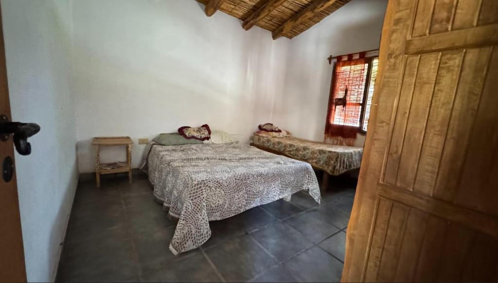Postel nebo postele na pokoji v ubytování Casona de Adobe Hospedaje