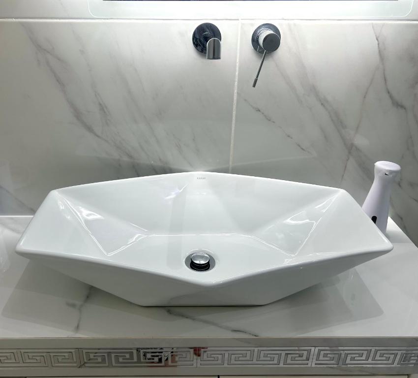 Kúpeľňa v ubytovaní Apartment Xenia