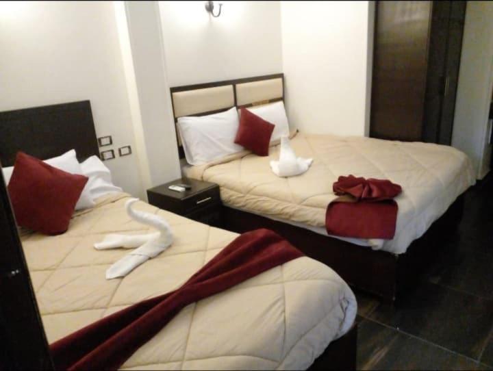 Postel nebo postele na pokoji v ubytování Town View Hotel