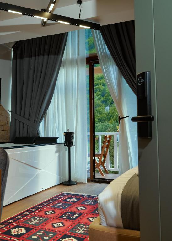 Postel nebo postele na pokoji v ubytování 'Gurra Family' Guesthouse