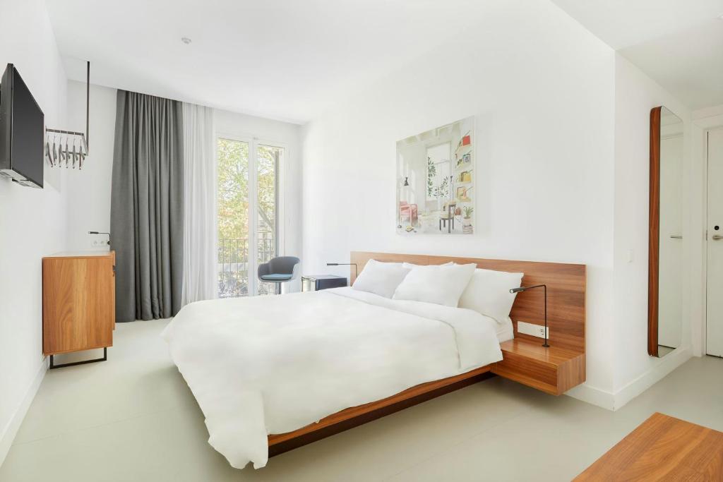 Posteľ alebo postele v izbe v ubytovaní La Casa Del Sol Hotel Gracia, Sonder by Marriott Bonvoy