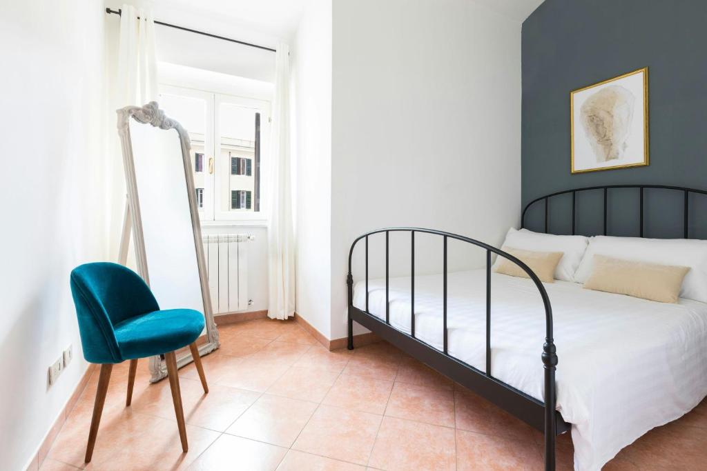 Una cama o camas en una habitación de Sonder by Marriott Bonvoy Piazza San Pietro Apartments Vaticano