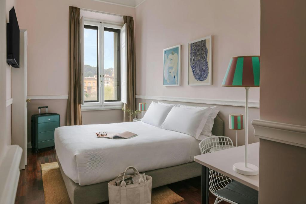 Postel nebo postele na pokoji v ubytování The Sonetto Hotel Santa Croce, Sonder by Marriott Bonvoy