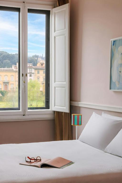 Postel nebo postele na pokoji v ubytování The Sonetto Hotel Santa Croce, Sonder by Marriott Bonvoy