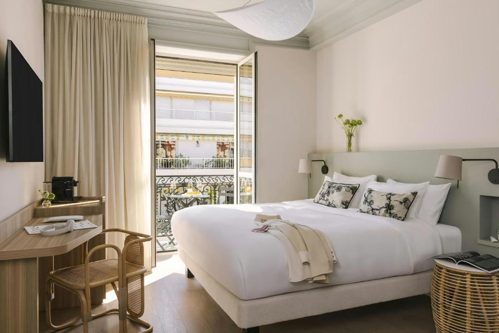 Postel nebo postele na pokoji v ubytování Yelo Mozart Hotel Les Musiciens, Sonder by Marriott Bonvoy
