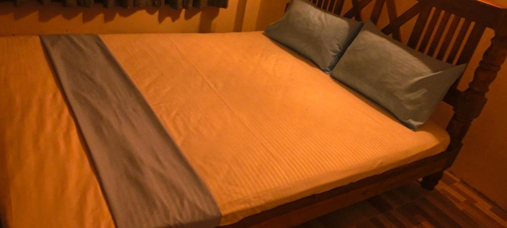 Postel nebo postele na pokoji v ubytování Holiday Home Ragama