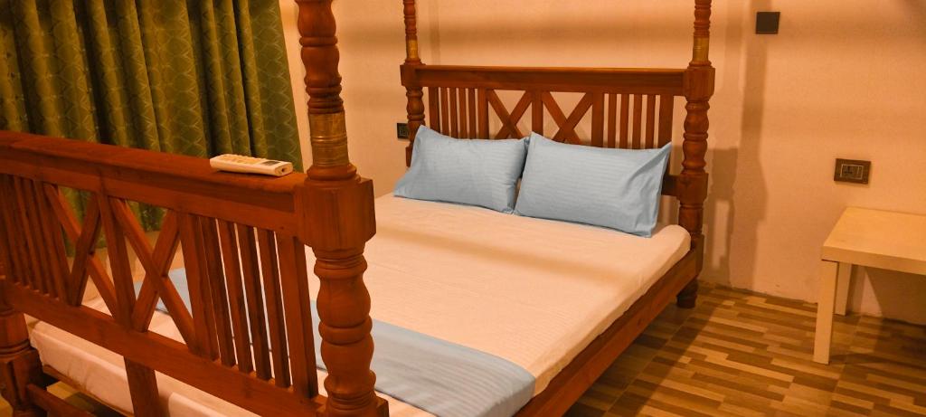 Postel nebo postele na pokoji v ubytování Holiday Home Ragama