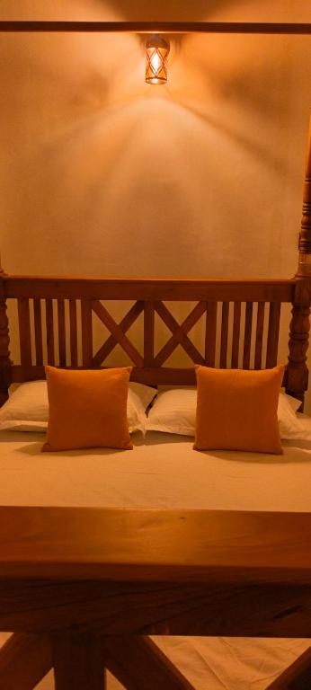 Postel nebo postele na pokoji v ubytování Holiday Home Ragama