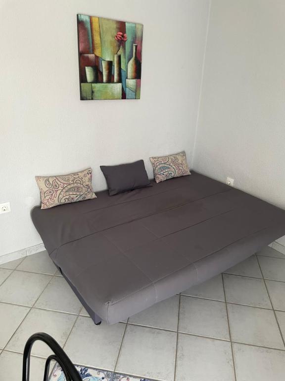 Postel nebo postele na pokoji v ubytování Theodora Villas Flogita beach