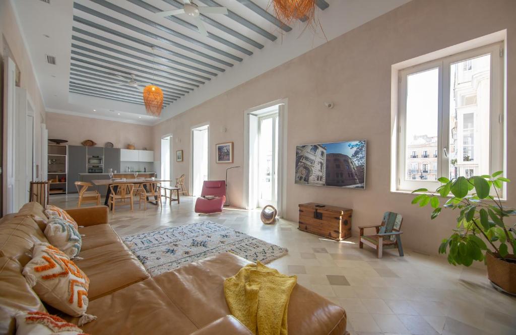 Televízia a/alebo spoločenská miestnosť v ubytovaní Casa Plaza San Antonio